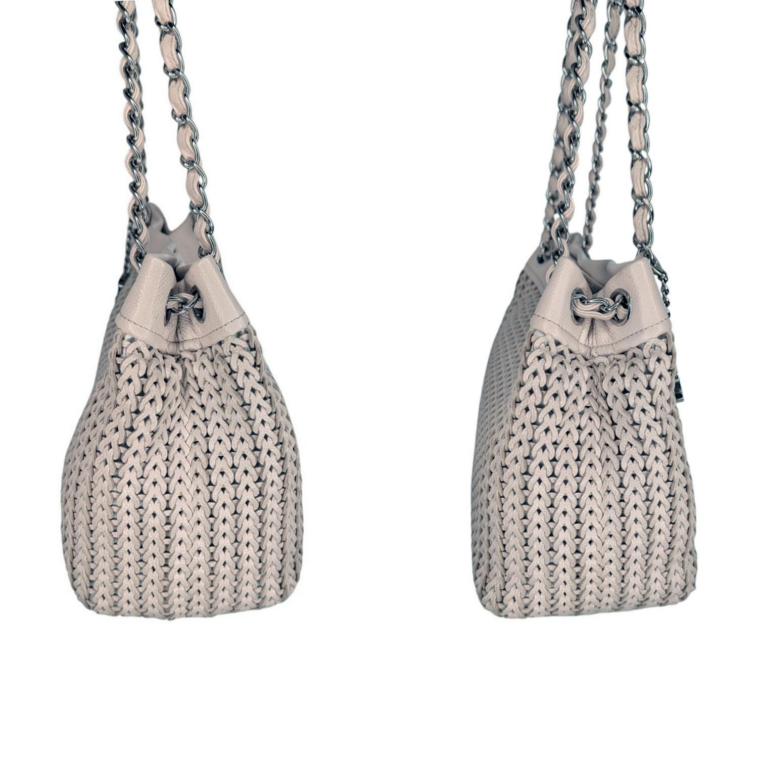 Women's Chanel Vintage CC Charm Beige Woven Leather Tote For Sale