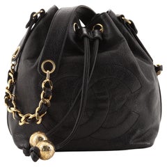 Sac seau à cordon coulissant vintage Chanel CC Caviar Petit