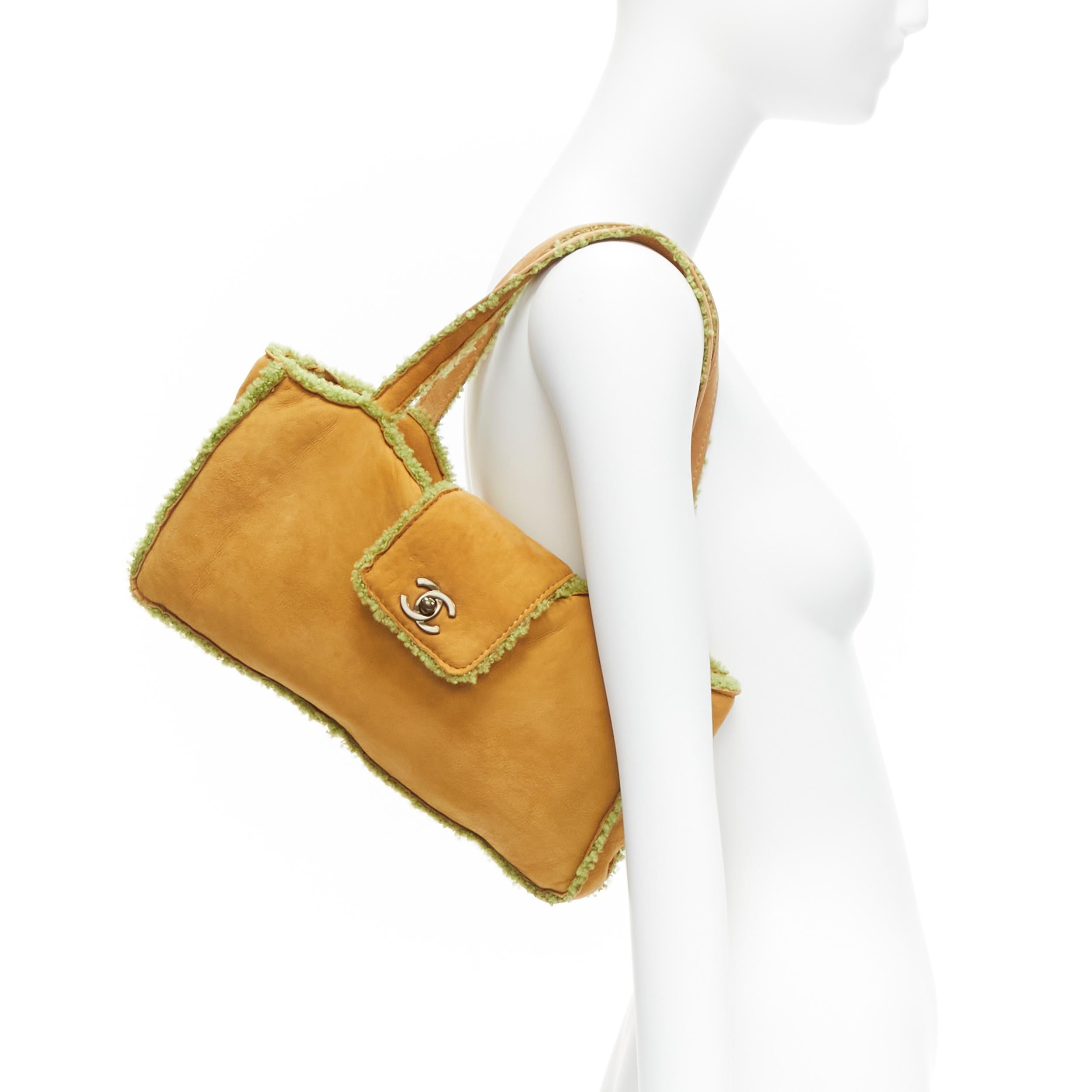 CHANEL Vintage CC turnlock tan brown green shearling leather shoulder tote bag
Reference: TGAS/D00170
Brand: Chanel
Designer: Karl Lagerfeld
Material: Shearling, Leather
Color: Brown, Green
Pattern: Solid
Closure: Turnlock
Lining: Brown Leather
Made