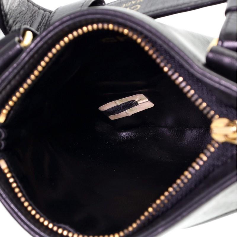 Women's or Men's Chanel Vintage CC Waist Bag Lambskin Small