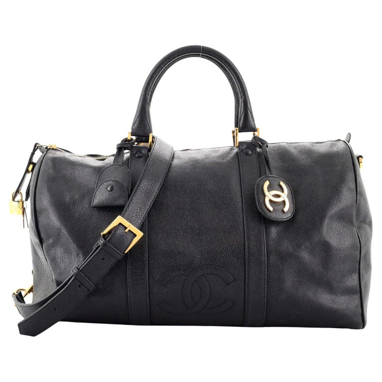 Chanel check leather travel bags handbag black
