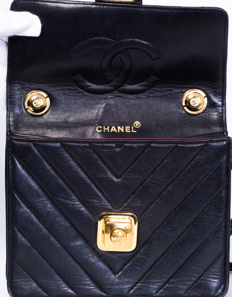 Women's or Men's Chanel Vintage Chevron Quilted Black Leather Mini Flap Bag with GHW (circa 1989) For Sale
