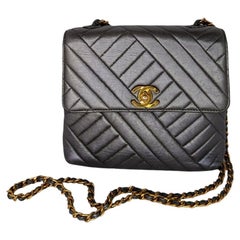 Vintage CHANEL black V, chevron stitch chain shoulder bag with golden –  eNdApPi ***where you can find your favorite designer  vintages..authentic, affordable, and lovable.