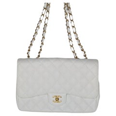 Authentic Chanel Vintage Large Quilted White Caviar Classic Tote – Classic  Coco Authentic Vintage Luxury