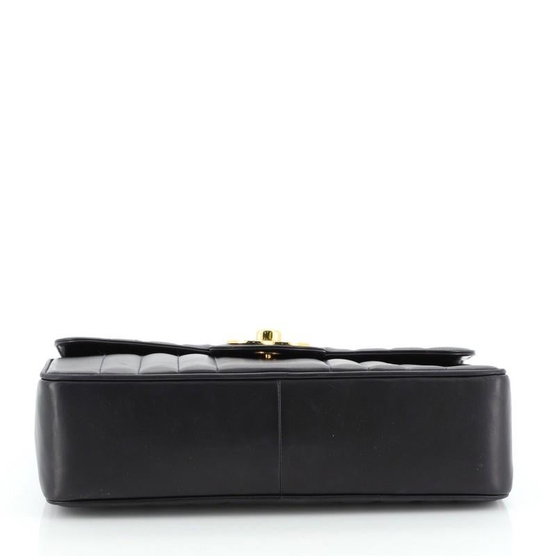 chanel vertical quilted bag