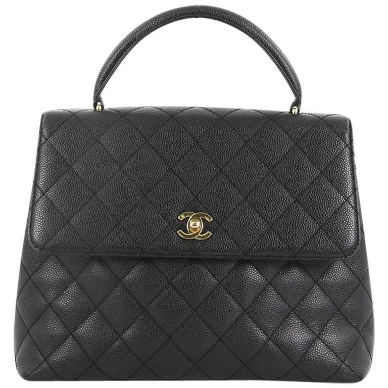 chanel top handle quilted bag