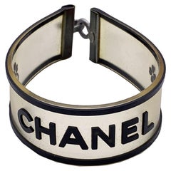 Chanel Vintage Clear and Black Rubber Logo Quatrefoil Bracelet