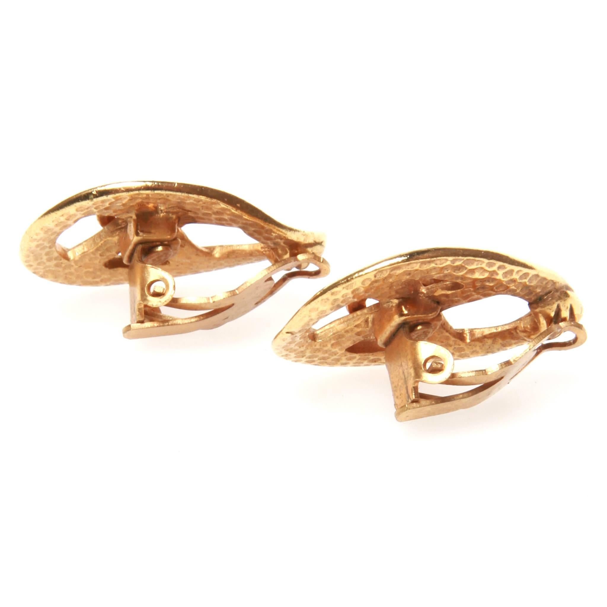 Chanel gold-tone vintage clip-on earrings featuring a teardrop design with interlocking CC at centre.