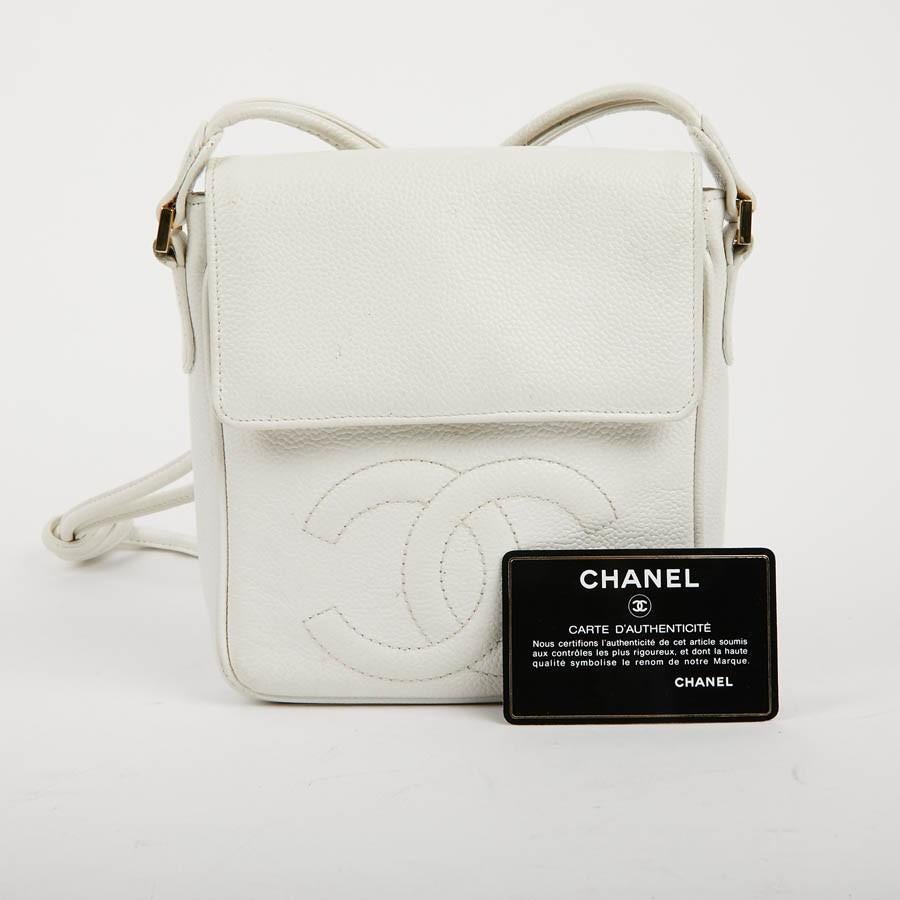 white leather clutch bag