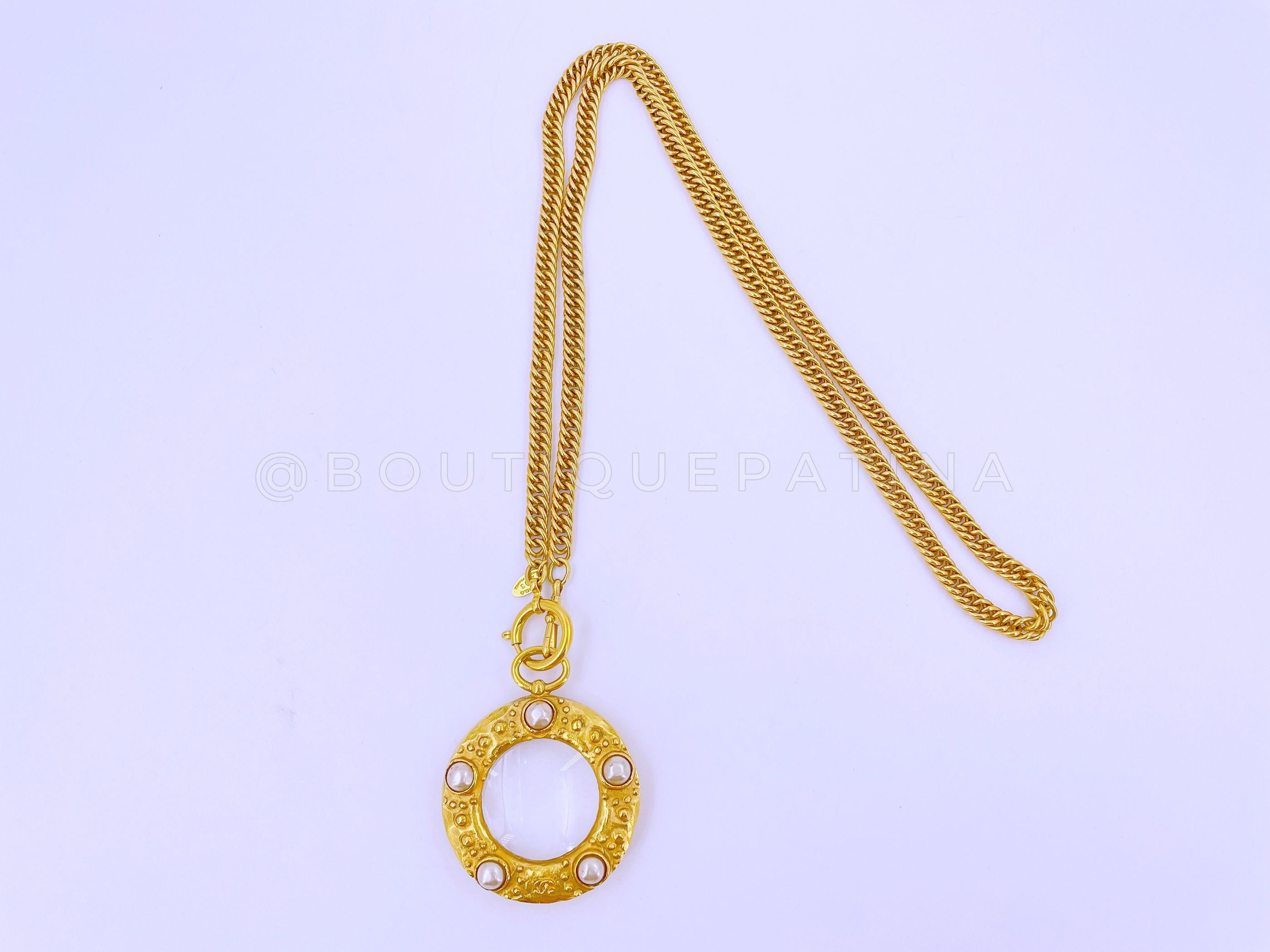 Store SKU: 65610
Chanel Vintage Collection 23 Pearl Studded Magnifying Glass Pendant Long Chain Necklace brushed gold and faux pearl studs from 1990

Measures 35 inches; chain is detachable, can be doubled

Condition: Excellent
For 19 years,