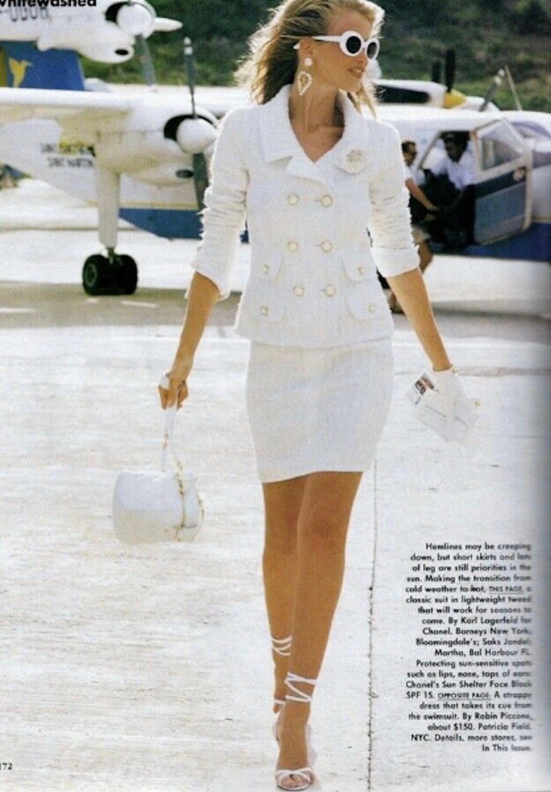 Step into timeless elegance with the iconic Chanel Cruise 1992 skirt suit, famously worn by supermodels Claudia Schiffer and Tatiana Patitz. This exquisite ensemble captures the essence of Chanel's classic allure, combining masterful craftsmanship