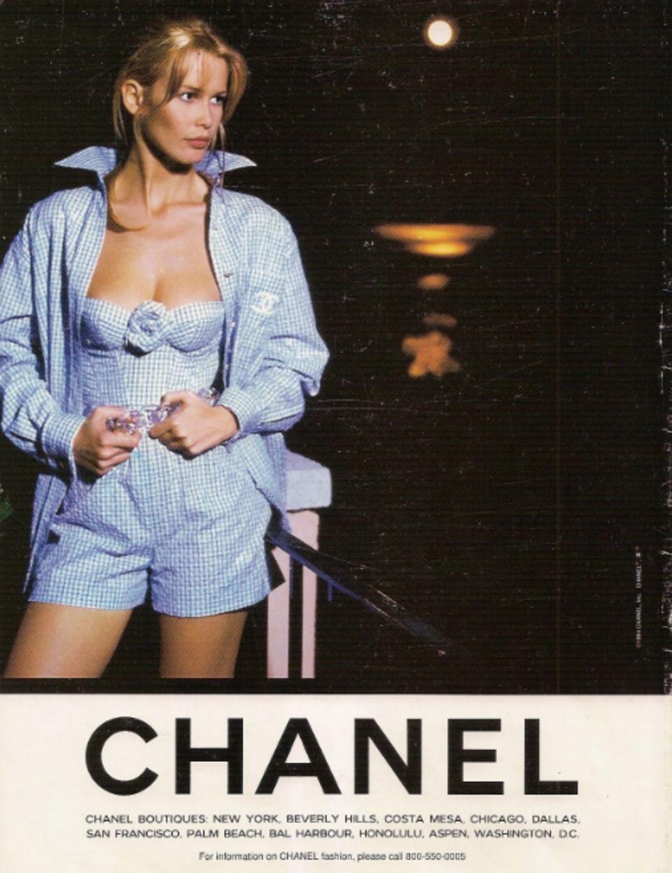 The rare blue and white sequin embellished gingham print 3pcs set from the Chanel Cruise 1995 collection is an exceptionally stunning piece. As seen on Claudia Schiffer, the set consists of cotton bustier top, shorts and a camellia brooch. In very