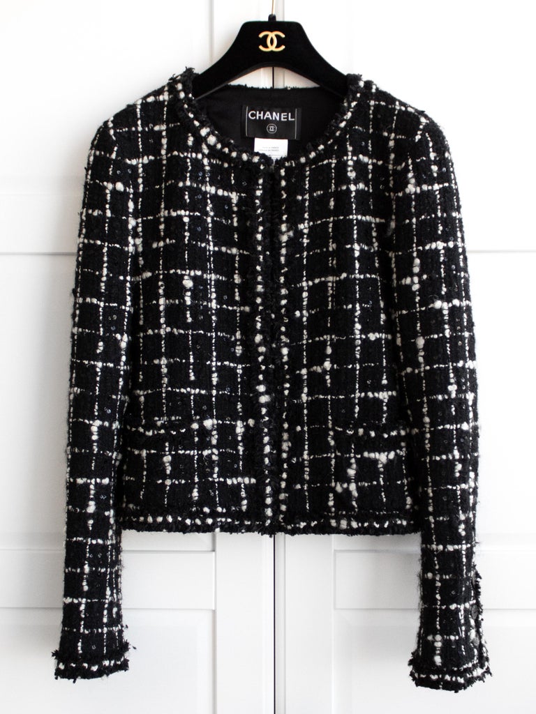 all white with black blazer