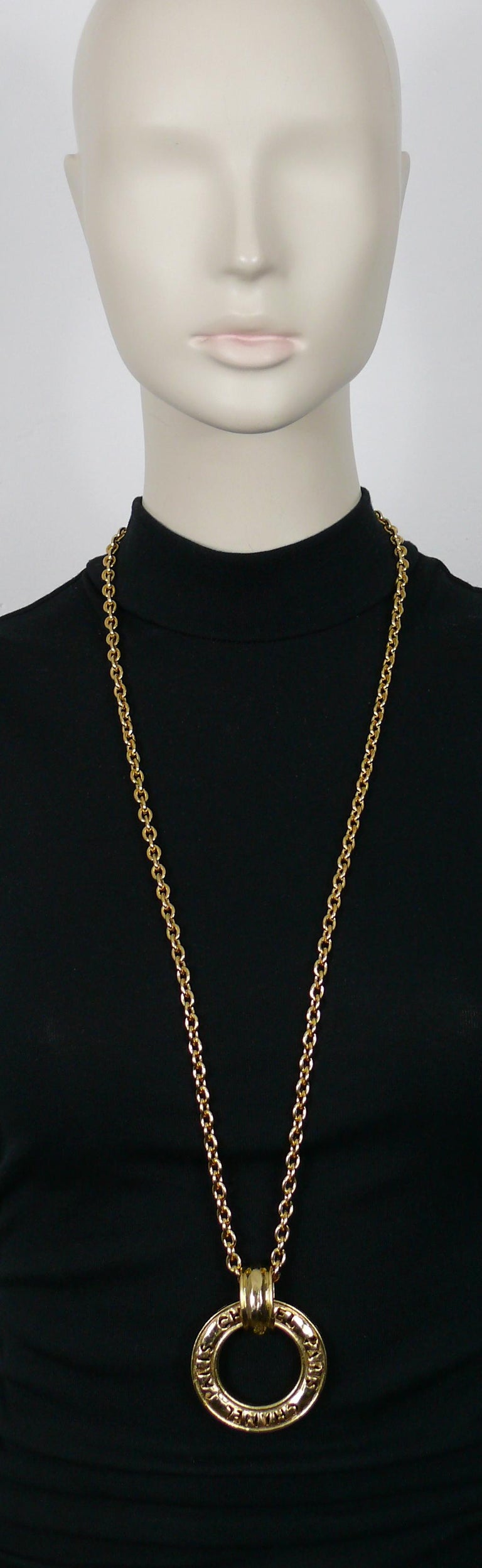 CHANEL Vintage Cutout Openwork Logo Medallion Necklace For Sale at 1stDibs
