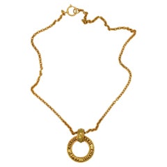 CHANEL Vintage Cutout Openwork Logo Medallion Necklace