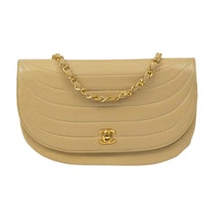 CHANEL, Vintage Demi Lune in beige leather