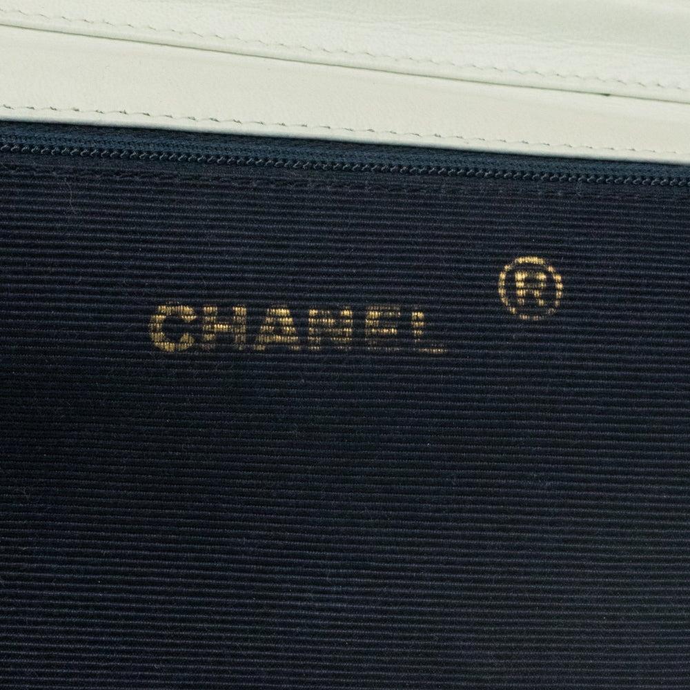 Women's or Men's CHANEL, Vintage Demi-Lune in white leather For Sale