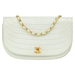 CHANEL, Vintage Demi-Lune in white leather