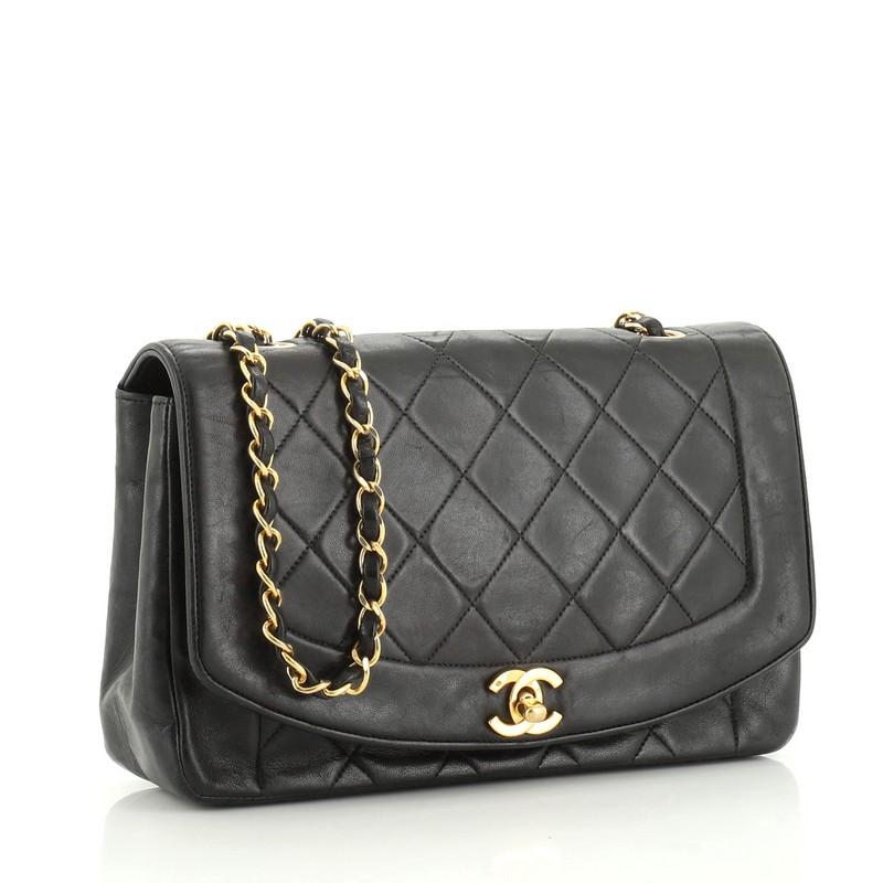 This Chanel Vintage Diana Flap Bag Quilted Lambskin Medium, crafted in black quilted lambskin leather, features woven in leather chain link strap and gold-tone hardware. Its CC turn-lock closure opens to a red leather interior with zip and slip