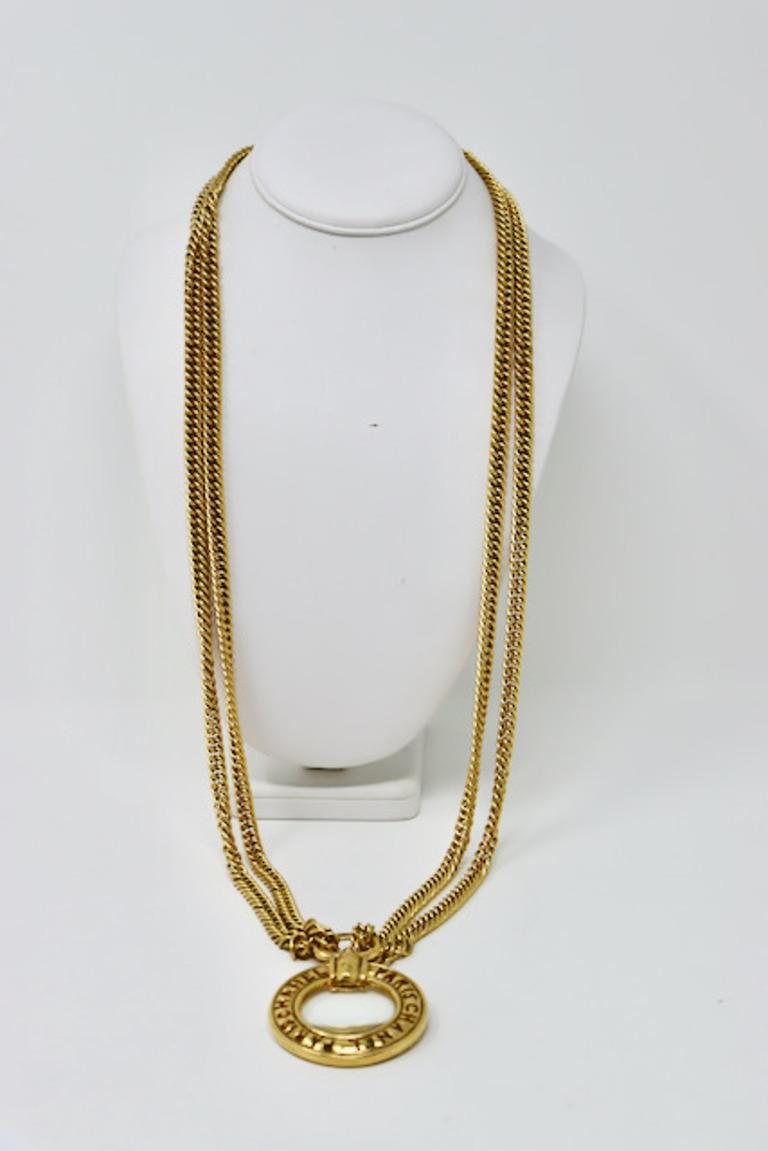 Vintage CHANEL Double Chain Necklace With Magnifying Glass!  I love these Chanel magnifying glass necklaces.  This one is even more special than most as it is double chained and the medallion says CHANEL PARIS.  It also doubles as a belt!  In