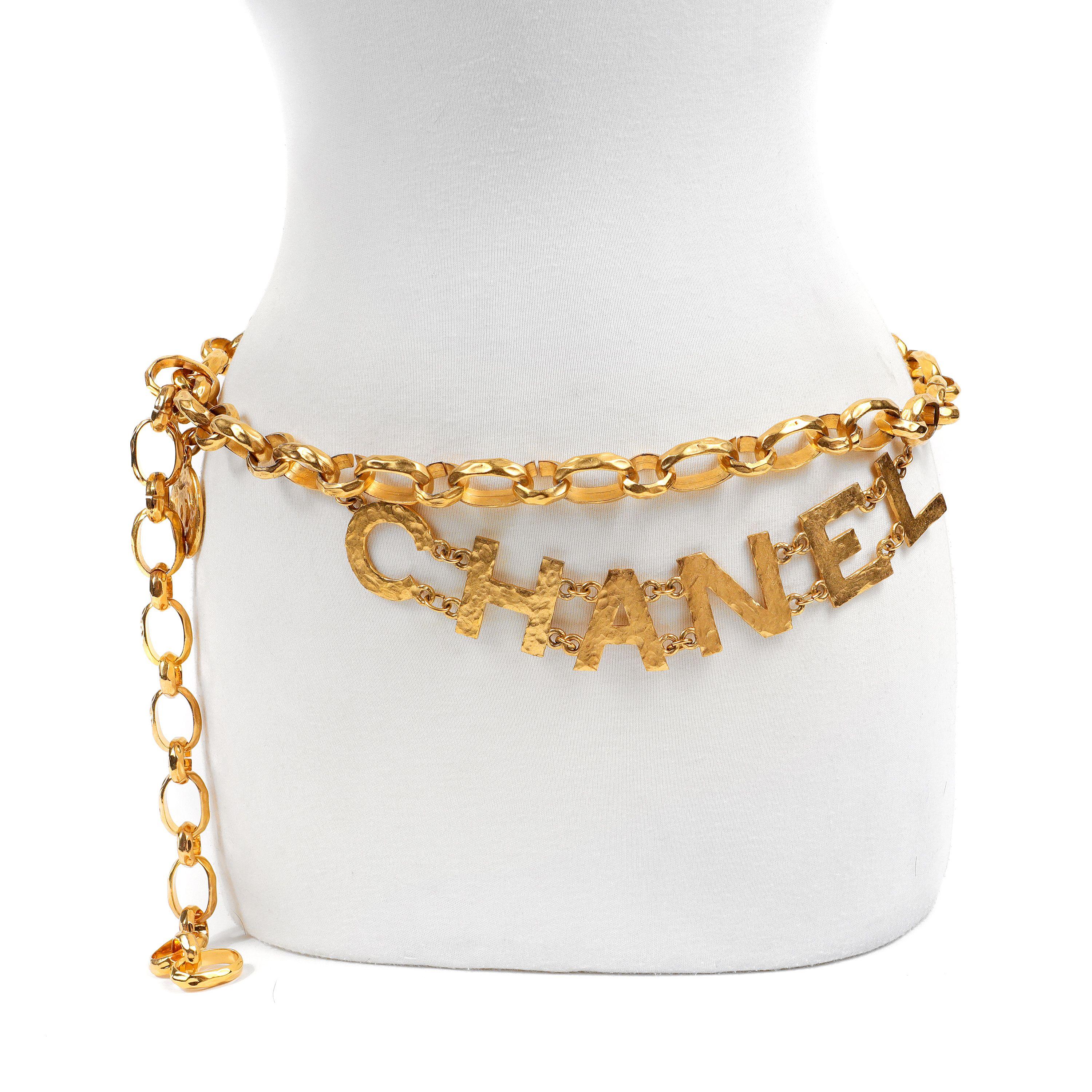 This authentic Chanel Vintage Double Chain CHANEL Runway Belt is pristine.  Highly collectible must have piece.  24 karat gold plated substantial link belt with CHANEL lettering.  Adjustable length.  

PBF 13762
