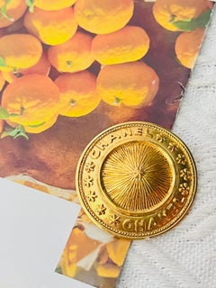 Chanel Vintage Double Logo CC Coco Cross Star Relief Radiant Round Domed Brooch