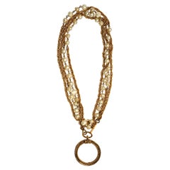 Collana Chanel Vintage a doppia catena di perle e oro dorato con lente d'ingrandimento