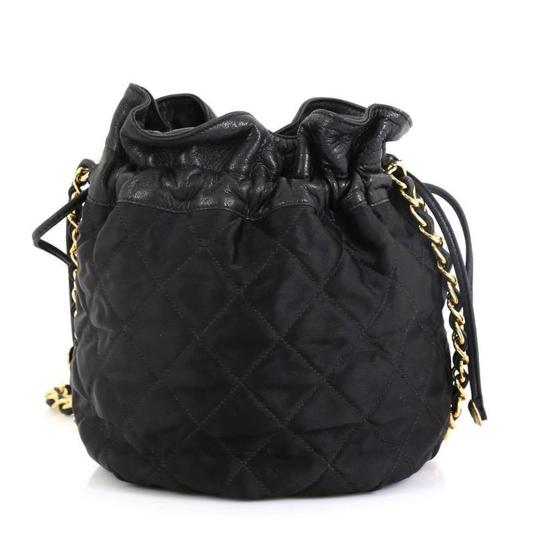 Chanel Shiny Aged Calfskin CC Chain Mini Drawstring Bag Black