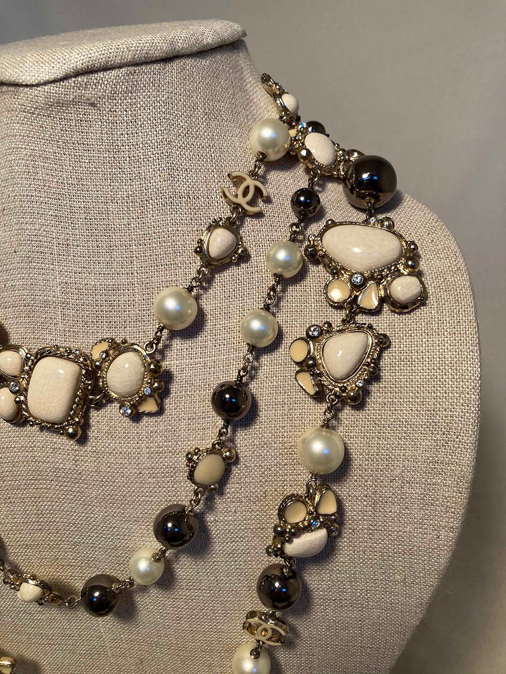 Chanel Vintage Enamel and Pearl Necklace in very good condition. pearl and gunmetal beads on silver chain with enamel stone accents and crystal details. Can be worn doubled or tripled around neck. No missing stones or scratches on beads. Very light