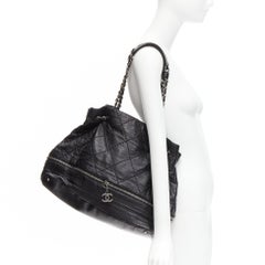 CHANEL Vintage Expandable ruthenium CC zip black quilted bucket tote bag