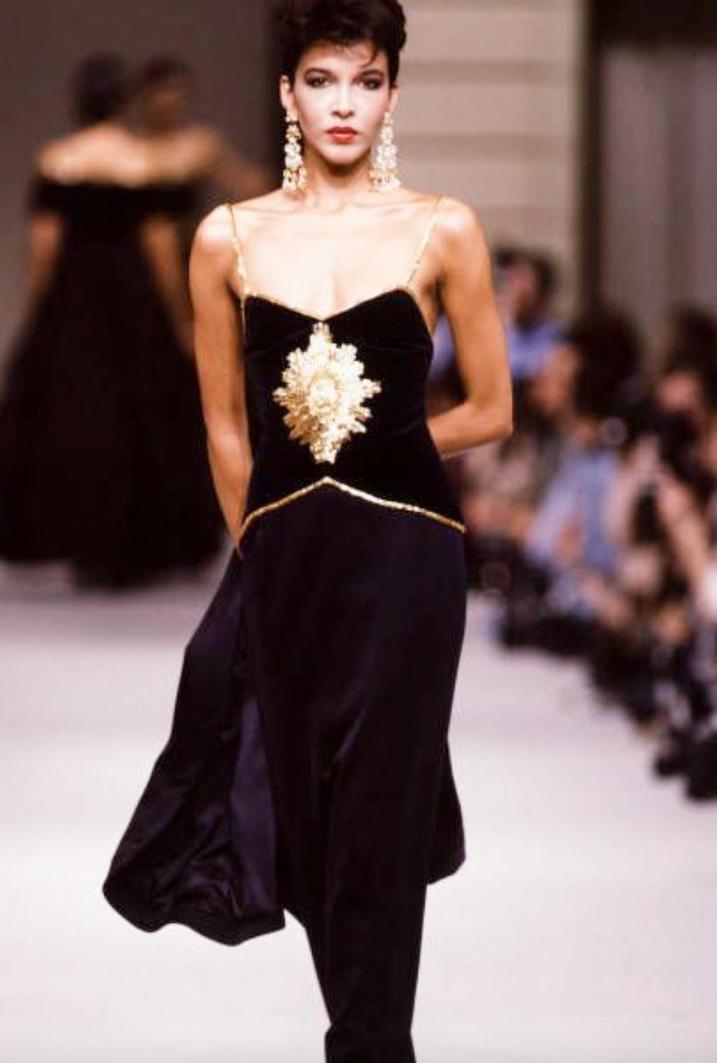 Capture the essence of timeless elegance with this extraordinary Chanel gown, a true masterpiece from the Fall/Winter 1985 collection designed by the legendary Karl Lagerfeld. 