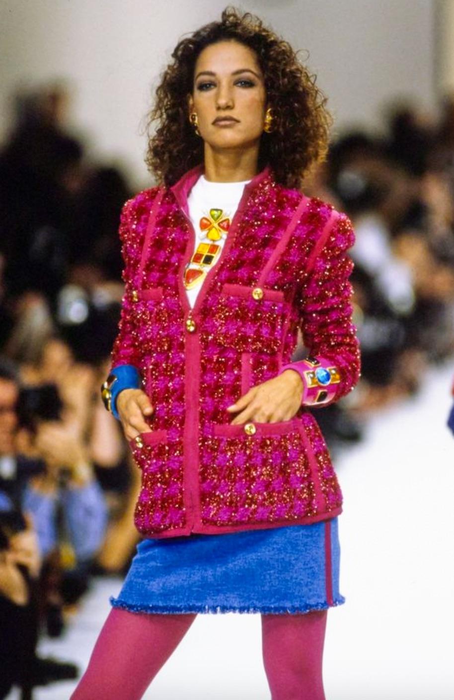 This vintage fuchsia pink jacket is a true gem from Karl Lagerfeld's iconic Fall/Winter 1991 'Hip-Hop' collection. As seen on top model Marpessa Hennick during the runway show, this collectible jacket features a shimmery pink houndstooth tweed
