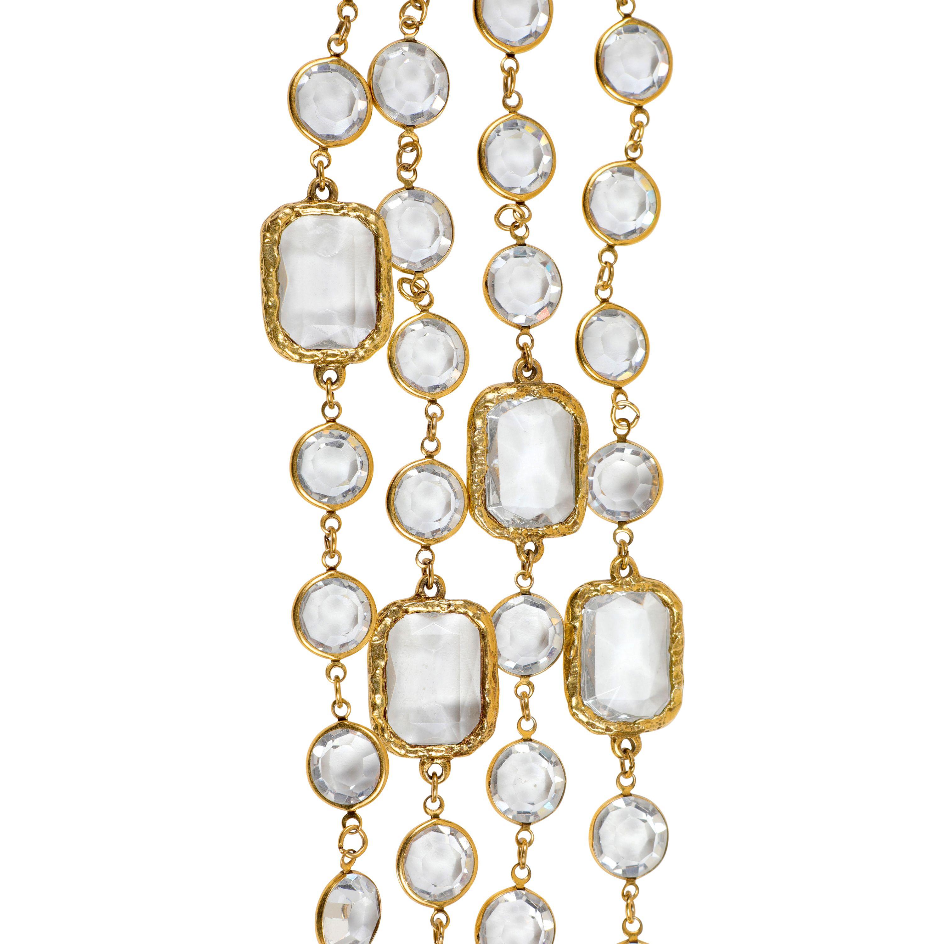 This authentic Chanel Faceted Crystal Necklace is in excellent vintage condition.    Round faceted crystals are interspersed with large rectangular crystals.  Gold tone hardware.   Pouch or box included.

PBF 13707
