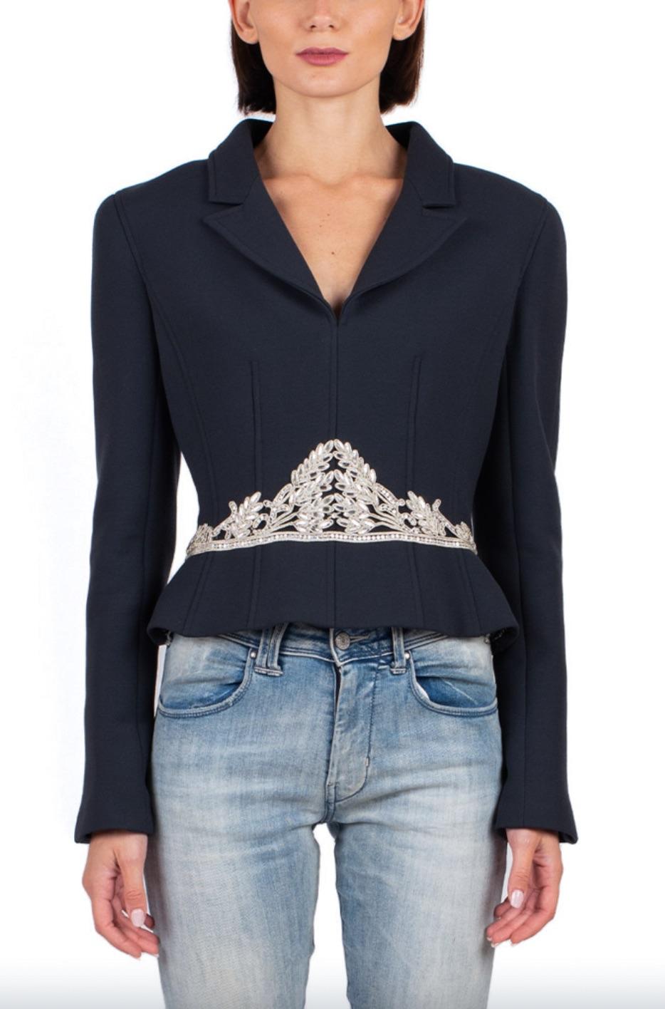 Exquisite navy jacket with silver tiara motives from the Chanel Fall 2002 collection. Royal, Haute Couture-like look! This breathtaking jacket has a fitted corset-like cut, concealed back zip closure, tiara-shape crystal embellishments at the