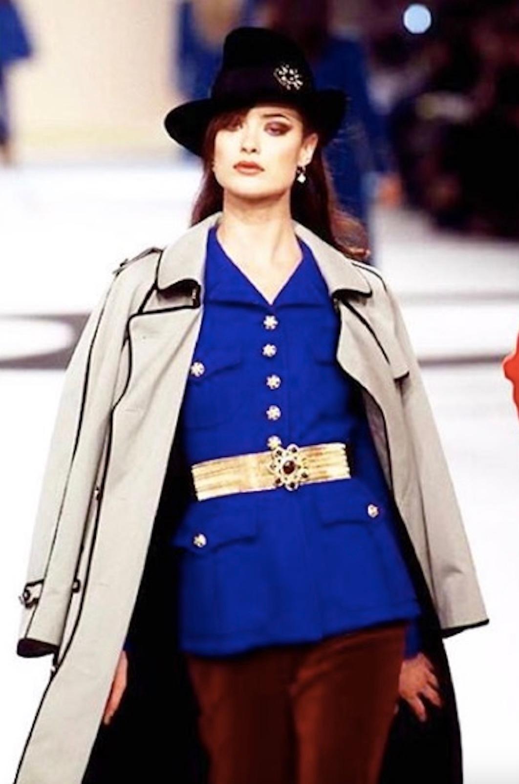 Indulge in a piece of fashion history with this exquisite Chanel jacket from the Fall/Winter 1996 collection. Channeling the essence of Lagerfeld's 