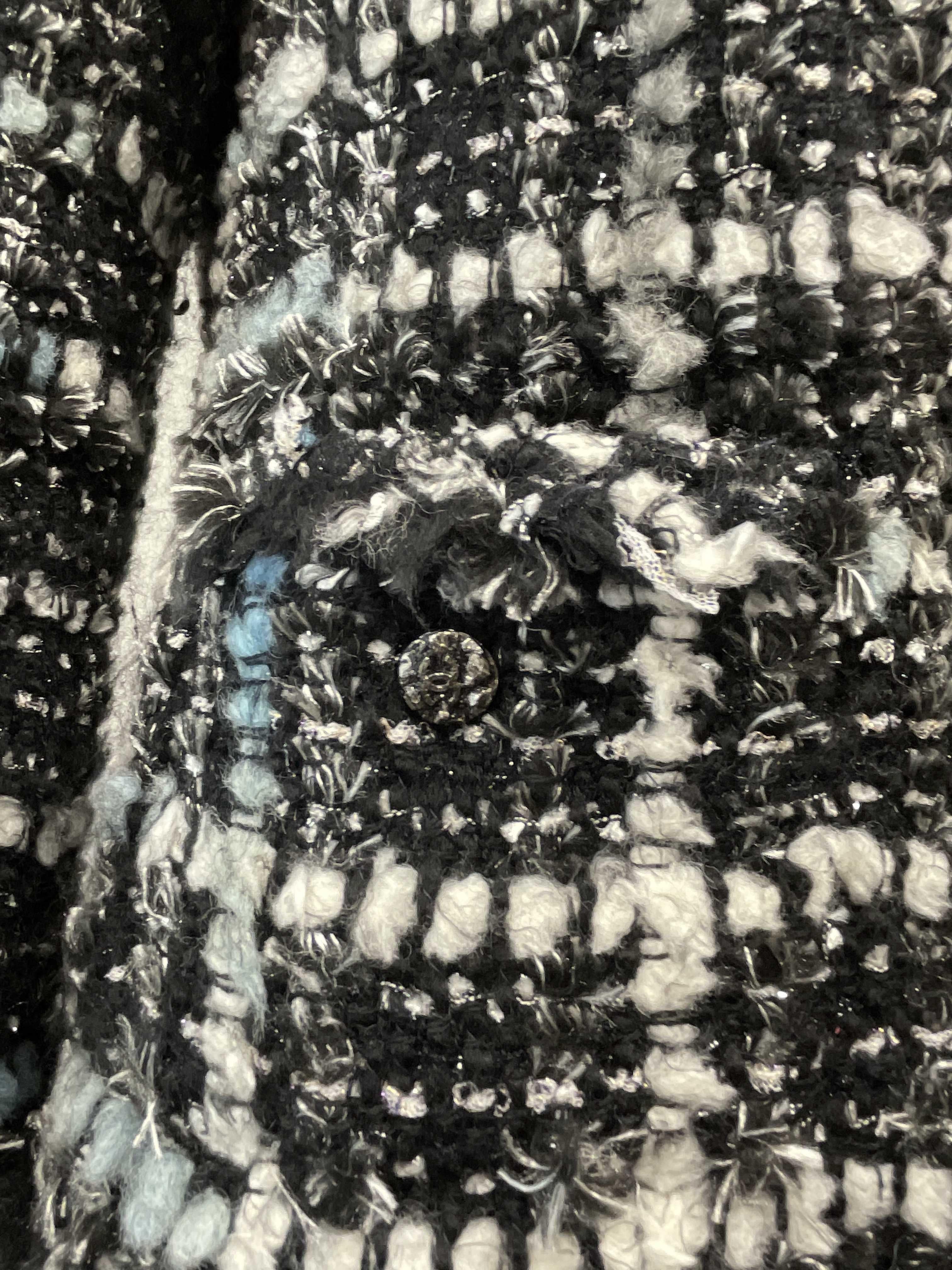 CHANEL - Vintage Frayed Tweed Collarless Blazer - CC Buttons 40 US 8

Description

* Black, White, Silver, and Blue tweed
* Frayed edges on bottom perimeter of sleeves and bottom of jacket
* Silver zipper closure
* Two front pockets with button
