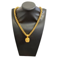 CHANEL Vintage Gold Braided Rope Necklace with CC Medallion Pendant
