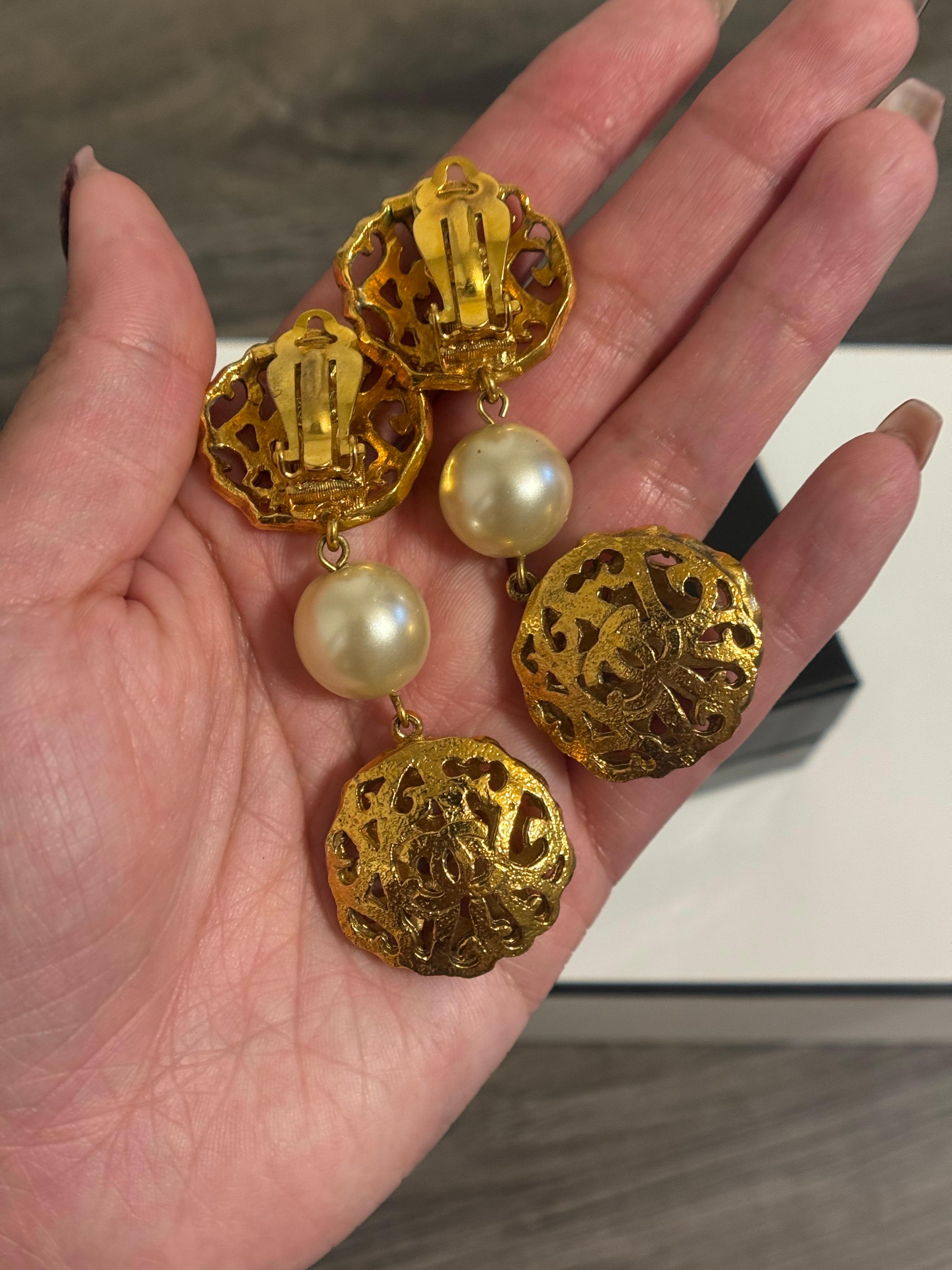 Women's or Men's CHANEL Vintage Gold CC Filigree and Pearl Dangle Clip On Earrings For Sale