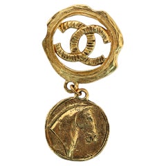 CHANEL Vintage Gold CC Logo Horse Charm Brooch