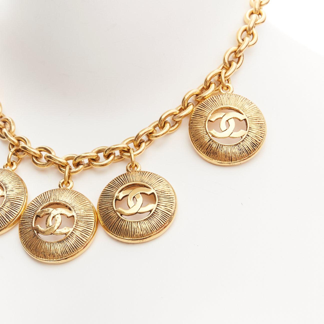 CHANEL Vintage gold CC medallion coin charm short chain necklace
Reference: TGAS/D00863
Brand: Chanel
Designer: Karl Lagerfeld
Collection: Circa 1990's
Material: Metal
Color: Gold
Pattern: Solid
Closure: Lobster Clasp
Lining: Gold Metal
Made in: