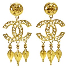 Chanel Retro Gold CC Ornate Dangle Clip On Earrings (1995)