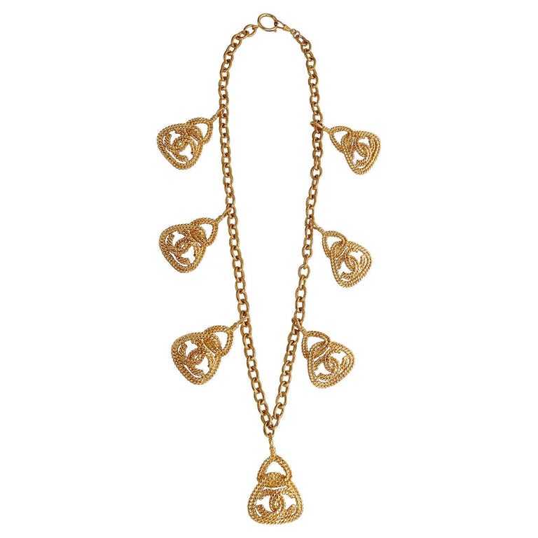 Chanel Collier à breloques vintage en corde CC en or En vente sur 1stDibs