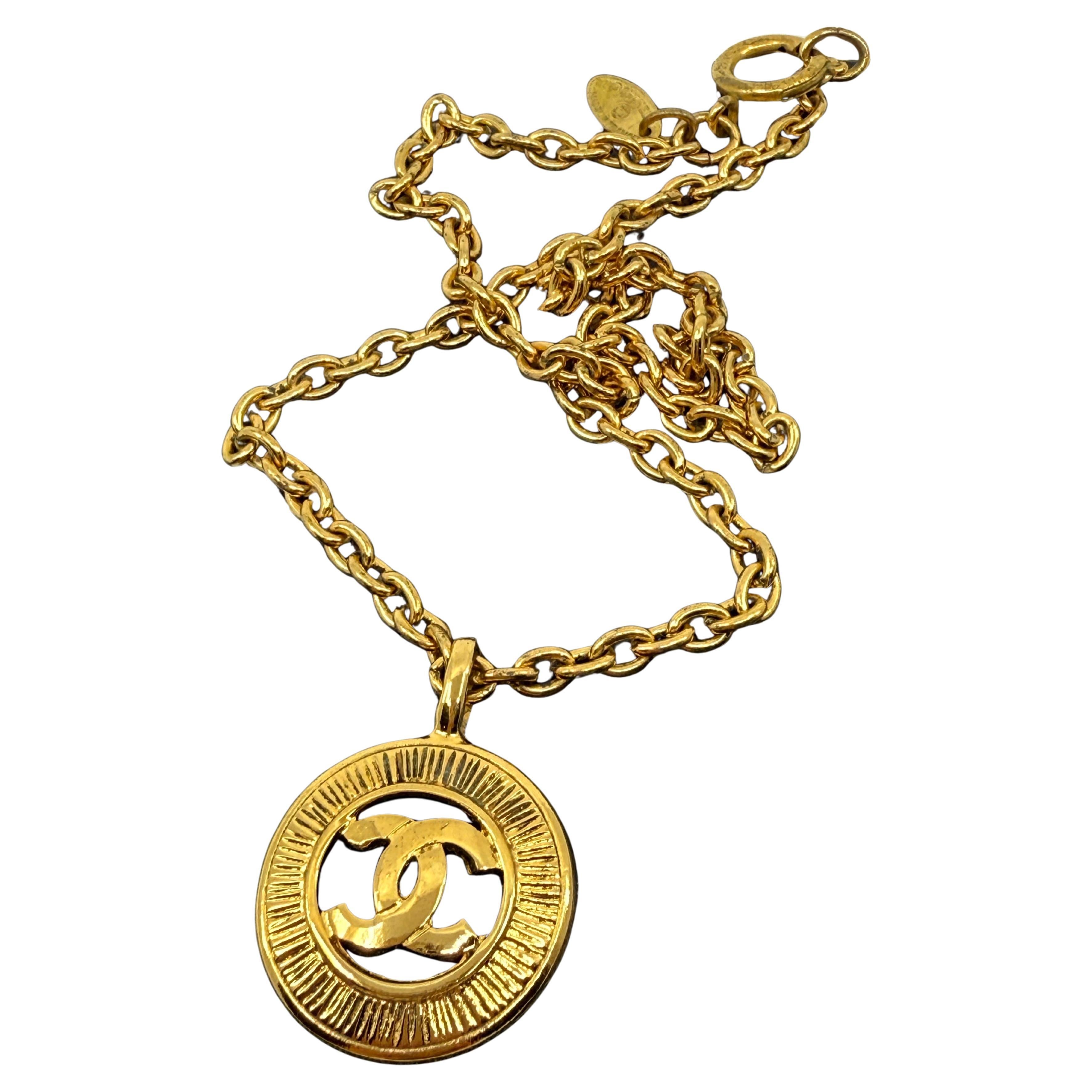 CHANEL Vintage Gold CC Sunburst Chain Pendant Necklace For Sale