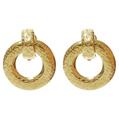 CHANEL Vintage gold etched CC logo monogram drop ring oversized clip on earrings
