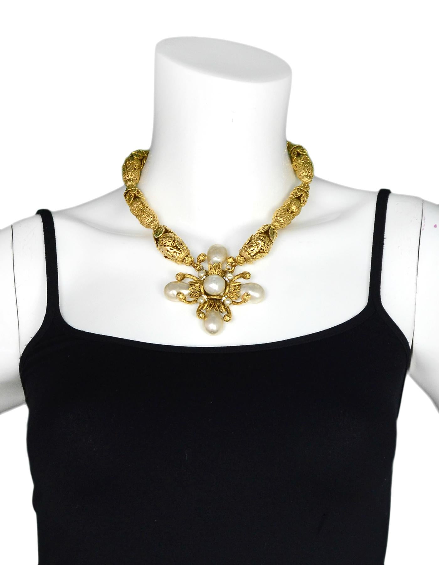 Chanel Gold Filigree Necklace W/ Faux Pearl Cross 

Color: Gold and white
Materials:  Goldtone metal and faux pearl
Hallmarks:   On back- 
