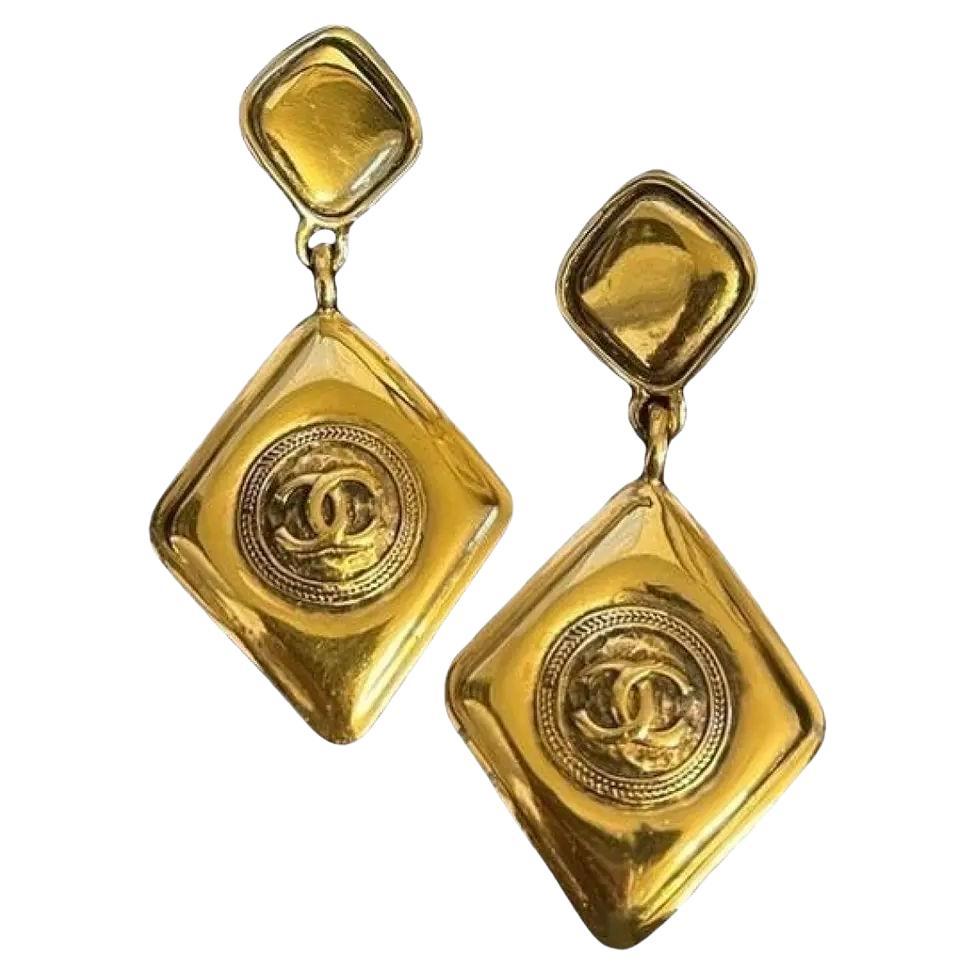 Chanel Vintage Gold Large Diamond CC Logo Drop Clip On Earrings, circa 1980s For Sale
