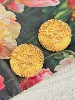 Chanel Vintage Gold Large Round Textured Logo CC Coco Button Sunburst Earrings