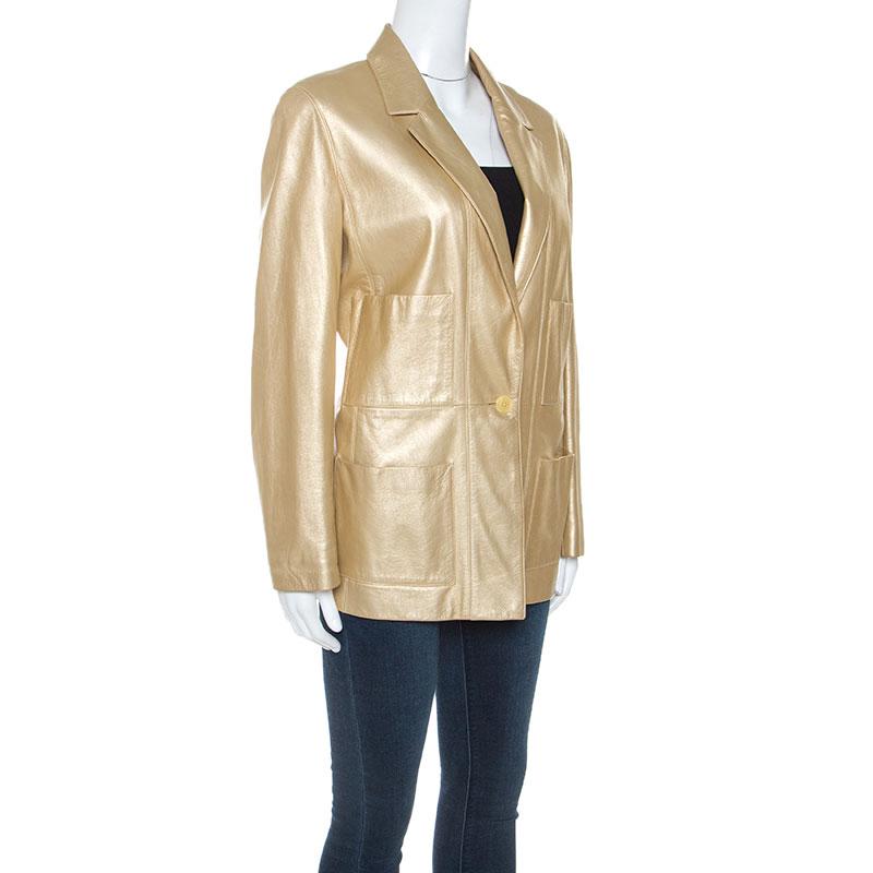 Leather creations have become a fashion centrepiece and for those who want to try something exclusive can invest in this Chanel Vintage gold blazer. Make your presence felt with this elegant blazer made of durable and quality leather. It comes with