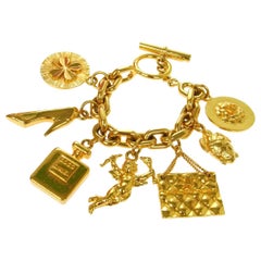 Chanel Vintage Gold Link CoCo Chanel Shoe Clover Angel Toggle 2.55 Bracelet