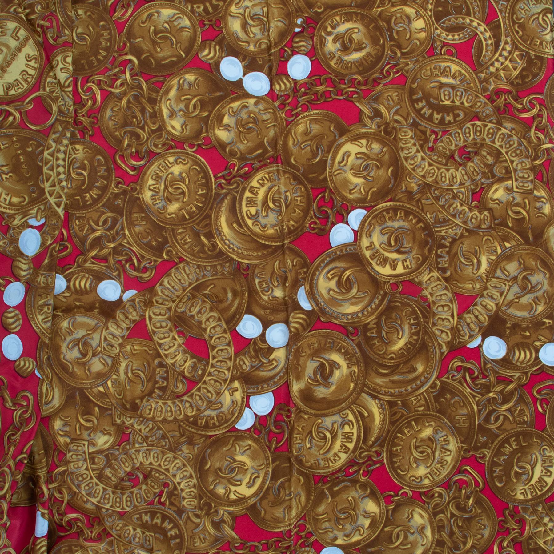 Chanel Vintage Gold Medallion Red XL Silk Scarf

A scarf just big enough to not only give you an elegant look but also keep you warm on a fall day.
This Chanel 31 Rue Cambon Paris scarf is made of 100% silk and beautifully finished with gold chains,